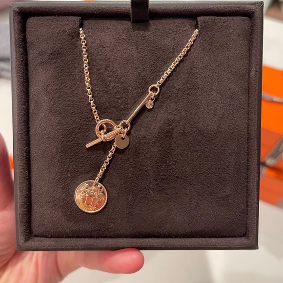 Hermes Jewelry - Hermes rose gold Ex-libris necklace